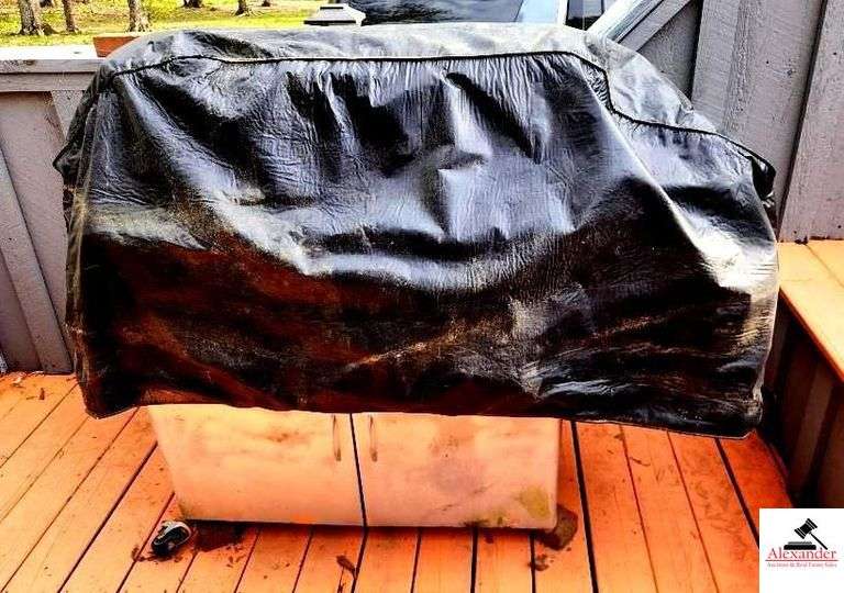 BRINKMANN GAS GRILL - TOP IS 17 1/2" DEEP X 35 1/2" WIDE - SIDE BURNER - APPEARS BEEN PAINTED - ROLLING FEET MISSING / BENT - PROPANE TANK INCLUDED - COVER - (PATIO)