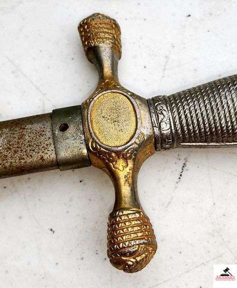WOLF BROWN W.B. SWORD - STAINLESS - GERMANY & METAL SHEATH  - SHOWS RUST & WORN - SWORD IN GOOD CONDITION FOR AGE - HANDLE HAS EAGLE HEAD