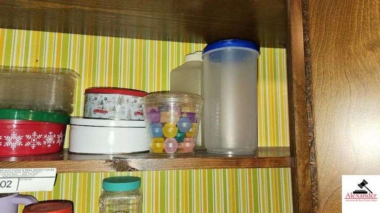 (5) TINS - TUBBERWARE JUGS - PLASIC GLASSES AND TUMBLERS - THERMOS - ICE CUBES - ICE TRAYS - PLASTIC FORKS - SMALL PLASTIC TRAYS -  ETC. - (UTILITY ROOM)