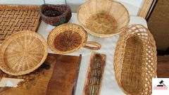WOOD SERVING TRAY - ONE RIM NEEDS GLUING BACK ON - SERVING BASKETS, SOME SHOW WEAR - SERVING TRAY HAS PIECE OF TAPE ON IT - GLASS LIDS - SERVING RACK - ROUND WOVEN BASKET WITH LID - SHOWS WEAR - (UTILITY ROOM)