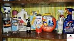 MISCELLANEOUS CLEANING SUPPLIES - TIDE PODS - LAMP OIL - CARPET CLEANER - MINERAL OIL - REGULAR STARCH - NOT ALL FULL - (UTILITY ROOM)