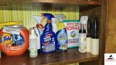 MISCELLANEOUS CLEANING SUPPLIES - TIDE PODS - LAMP OIL - CARPET CLEANER - MINERAL OIL - REGULAR STARCH - NOT ALL FULL - (UTILITY ROOM)