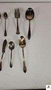 (24) TOTAL PCS. - (5) SUGAR SHELLS - (4) ICE TEA SPOONS - (6) SALAD FORKS - (2) ICE TEA SPOONS -  PICKLE FORK - BUTTER KNIFE - TEA SPOON - SERVING FORK - ETC. - (MAPLE HUTCH GREAT ROOM)