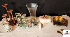 RUBBER LEAF FLOWERS - WOOD CANDLE STAND - DRESSER BOX WITH APPLIED FLOWERS - ONE LEAF BROKEN OFF - VASE WITH LADY - CLEAR GLASS VASE - GOOFUS GLASS BOWL NEEDS REPAIR RIM BROKEN - (GREAT ROOM CABINETS)
