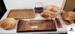 WOOD SERVING TRAY - ONE RIM NEEDS GLUING BACK ON - SERVING BASKETS, SOME SHOW WEAR - SERVING TRAY HAS PIECE OF TAPE ON IT - GLASS LIDS - SERVING RACK - ROUND WOVEN BASKET WITH LID - SHOWS WEAR - (UTILITY ROOM)