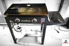 BLACKSTONE GRILL - TOP IS 18" X 29" -PLASTIC COVER W/ HOLE  - (GARAGE)