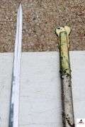 WOLF BROWN W.B. SWORD - STAINLESS - GERMANY & METAL SHEATH  - SHOWS RUST & WORN - SWORD IN GOOD CONDITION FOR AGE - HANDLE HAS EAGLE HEAD