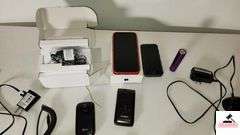 CELLPHONES AND PHONE CHARGERS - IPHONE HEAD PHONE CORD - (2) SMART PHONES - (2) FLIP PHONES, VERIZON LG, AICOTEL - POWERBANK ON THE GO CHARGER - (NE BEDROOM CLOSET)