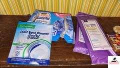 MISCELLANEOUS CLEANING SUPPLIES - TIDE PODS - LAMP OIL - CARPET CLEANER - MINERAL OIL - REGULAR STARCH - NOT ALL FULL - (UTILITY ROOM)