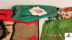COLLECTION OF APRONS - DIRTY SANTA  APRON - (MAPLE HUTCH GREAT ROOM)