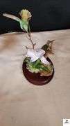 (2) MARURI HUMMINGBIRD FINE  PORCELAIN AND BRONZE STUDIO DESIGN H8905 ANNA'S HUMMINGBIRD WITH LILY, CIRCA 1989, BROKEN LIMB AND A RUBY THROATED HUMMINGBIRD WITH ORCHAD, LEAF MISSING OR BIRD, WING BROKEN - (2) HUMMINGBIRDS - (GREAT ROOM)