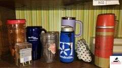 (5) TINS - TUBBERWARE JUGS - PLASIC GLASSES AND TUMBLERS - THERMOS - ICE CUBES - ICE TRAYS - PLASTIC FORKS - SMALL PLASTIC TRAYS -  ETC. - (UTILITY ROOM)