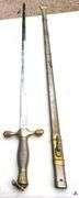 WOLF BROWN W.B. SWORD - STAINLESS - GERMANY & METAL SHEATH  - SHOWS RUST & WORN - SWORD IN GOOD CONDITION FOR AGE - HANDLE HAS EAGLE HEAD