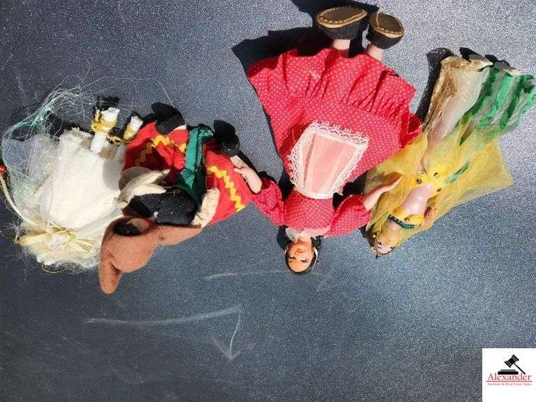 (4) CLOTH DOLLS - ONE NOSE DAMAGED - (GARAGE)