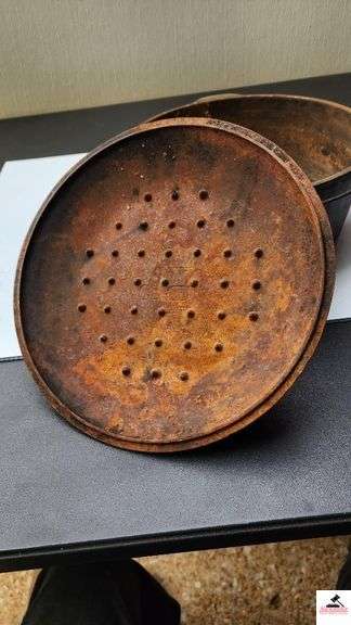 DUTCH OVEN WITH LID AND METAL VAIL - NEEDS CLEANING LID IS RUSTY - (TRAILER)