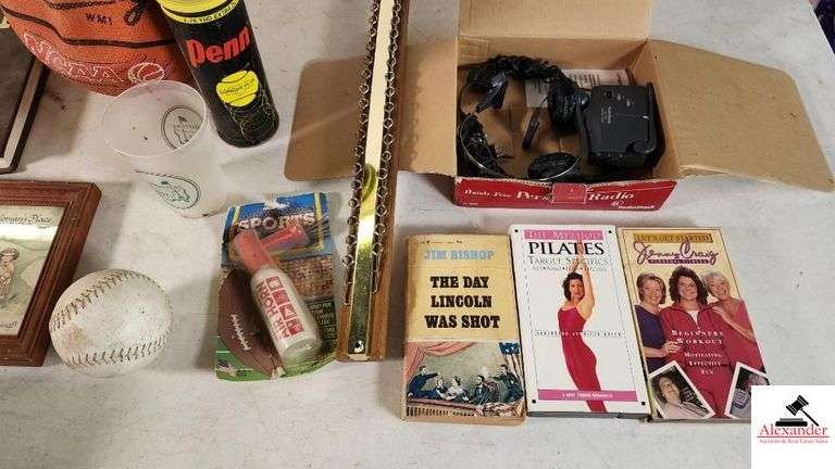 RAWLING BASKETBALL, SOFT BALL - PILATES CD - JENNY CRAIG CD - THE DAY LINCOLN WAS SHOT PAPERBACK - AIR HORN - TENNIS BALLS - UTM BOOK -   TOTE PAD