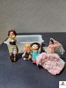 (4) CLOTH DOLLS - ONE NOSE DAMAGED - (GARAGE)