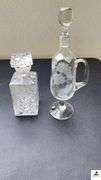 HEAVY PRESSED LIQUIOR DECANTER - ETCHED CRYSTAL DECANTER - ETCHED FLOWERS AND BUTTERFLY - PEDESTAL PITCHER WITH GLASS STOPPER - (GARAGE)