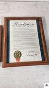 (3) FRAMES - NED RAY MCWHERTER PICTURE AND SIGNATURE - ANOTHER SIGNED PICTURE - RESOLUTION DOCUMENT FRAMED - (TRAILER)