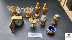 PRESSED GLASS CREAMER AND SUGAR, SUGAR BOWL RIM IS CHIPPED - MOON AND STAR GOLD VASE - GOLD CHINA SALT AND PEPPERS - GOLD SALT AND PEPPER SHAKERS - LITTLE GOLD FOOTED DRESSER PC. WITH COBALT LINING - LITTLE PICKLE SPEARS, ONE MISSING - BULIFORD GIFTS MINI CLOCK IN GOLD CASE - (GARAGE)