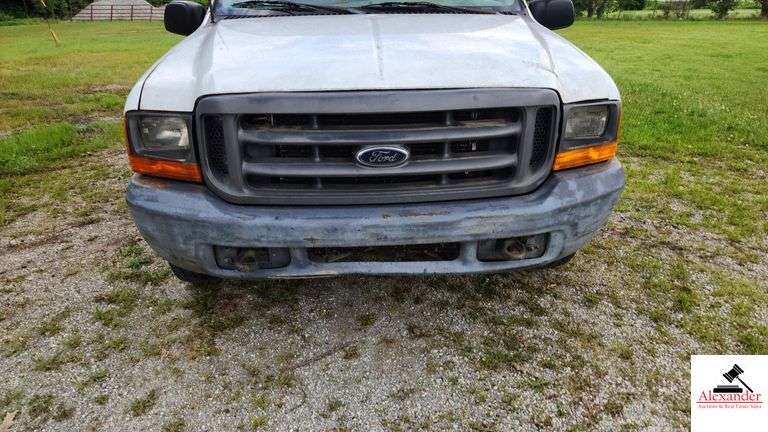 2000 FORD F250 XL SUPER DUTY PICK UP TRUCK - 202,414 MILES - 4 SPEED FLOOR SHIFT - 2 DOOR 0 V10,6.8L  -GASOLINE - INDSHIELD CRACKED - FRONT BUMPER DENTED AND SHOWS RUST - HOOD DENTED WITH RUST SPOT - DRIVERS SIDE DOOR FRONT FENDER AND DOOR BENT, TOP OF REAR REAR QUARTER PANEL DENTED TAILGATE DENTED, SCRATCHED, AND PUNCTURED - BUMPER SHOWS RUST AND DENTED- SIDE MOUNTED TOOL BOXES WITH RUST - PASSENGERS SIDE REAR QUARTER PANEL BENT IN SEVERAL PLACES WITH SCRATCHES, FRONT FENDER WHEEL DENTED - NUMEROUS SCRATCHES, WEAR, AND PECKS - SEATS SHOW WEAR AND HOLES  - VIN# 1FTNF20S0YEB61867
