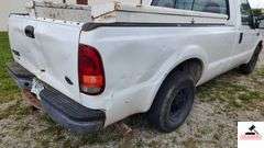 2000 FORD F250 XL SUPER DUTY PICK UP TRUCK - 202,414 MILES - 4 SPEED FLOOR SHIFT - 2 DOOR 0 V10,6.8L  -GASOLINE - INDSHIELD CRACKED - FRONT BUMPER DENTED AND SHOWS RUST - HOOD DENTED WITH RUST SPOT - DRIVERS SIDE DOOR FRONT FENDER AND DOOR BENT, TOP OF REAR REAR QUARTER PANEL DENTED TAILGATE DENTED, SCRATCHED, AND PUNCTURED - BUMPER SHOWS RUST AND DENTED- SIDE MOUNTED TOOL BOXES WITH RUST - PASSENGERS SIDE REAR QUARTER PANEL BENT IN SEVERAL PLACES WITH SCRATCHES, FRONT FENDER WHEEL DENTED - NUMEROUS SCRATCHES, WEAR, AND PECKS - SEATS SHOW WEAR AND HOLES  - VIN# 1FTNF20S0YEB61867