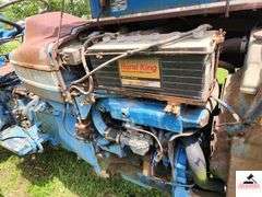 1968 FORD 4000 TRACTOR - 2 SPEED - HOURS UNKNOWN -  FIXER UPPER OR PARTS TRACTOR - BENT STEP - BUMPER BENT - METAL HOOD & PANELS RUSTY - SEAT CUSHIONS ARE GOINE - TRACTOR ROLLS - ONE REAR TIRE FLAT AND BUSTED - BEEN SITTING FOR SEVERAL YEARS -BOTH FRONT LIGHTS MISSING - REAR DRAW BAR - 3 POINT HITCH ARMS - HAS OIL - TRACTOR # C204765 - MODEL # 41024C - UNIT #  8E135 - ENGINE # 8C18A - TRANSMISSION # 8A05E - HYDRAULIC PUMP # 8018B - REAR AXLE # 8814B - HYDRAULIC UNIT #80151 - RURAL KING BATTERY SHIPPED IN MARCH 2014