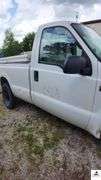 2000 FORD F250 XL SUPER DUTY PICK UP TRUCK - 202,414 MILES - 4 SPEED FLOOR SHIFT - 2 DOOR 0 V10,6.8L  -GASOLINE - INDSHIELD CRACKED - FRONT BUMPER DENTED AND SHOWS RUST - HOOD DENTED WITH RUST SPOT - DRIVERS SIDE DOOR FRONT FENDER AND DOOR BENT, TOP OF REAR REAR QUARTER PANEL DENTED TAILGATE DENTED, SCRATCHED, AND PUNCTURED - BUMPER SHOWS RUST AND DENTED- SIDE MOUNTED TOOL BOXES WITH RUST - PASSENGERS SIDE REAR QUARTER PANEL BENT IN SEVERAL PLACES WITH SCRATCHES, FRONT FENDER WHEEL DENTED - NUMEROUS SCRATCHES, WEAR, AND PECKS - SEATS SHOW WEAR AND HOLES  - VIN# 1FTNF20S0YEB61867