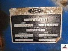 1968 FORD 4000 TRACTOR - 2 SPEED - HOURS UNKNOWN -  FIXER UPPER OR PARTS TRACTOR - BENT STEP - BUMPER BENT - METAL HOOD & PANELS RUSTY - SEAT CUSHIONS ARE GOINE - TRACTOR ROLLS - ONE REAR TIRE FLAT AND BUSTED - BEEN SITTING FOR SEVERAL YEARS -BOTH FRONT LIGHTS MISSING - REAR DRAW BAR - 3 POINT HITCH ARMS - HAS OIL - TRACTOR # C204765 - MODEL # 41024C - UNIT #  8E135 - ENGINE # 8C18A - TRANSMISSION # 8A05E - HYDRAULIC PUMP # 8018B - REAR AXLE # 8814B - HYDRAULIC UNIT #80151 - RURAL KING BATTERY SHIPPED IN MARCH 2014