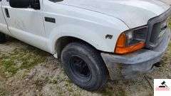2000 FORD F250 XL SUPER DUTY PICK UP TRUCK - 202,414 MILES - 4 SPEED FLOOR SHIFT - 2 DOOR 0 V10,6.8L  -GASOLINE - INDSHIELD CRACKED - FRONT BUMPER DENTED AND SHOWS RUST - HOOD DENTED WITH RUST SPOT - DRIVERS SIDE DOOR FRONT FENDER AND DOOR BENT, TOP OF REAR REAR QUARTER PANEL DENTED TAILGATE DENTED, SCRATCHED, AND PUNCTURED - BUMPER SHOWS RUST AND DENTED- SIDE MOUNTED TOOL BOXES WITH RUST - PASSENGERS SIDE REAR QUARTER PANEL BENT IN SEVERAL PLACES WITH SCRATCHES, FRONT FENDER WHEEL DENTED - NUMEROUS SCRATCHES, WEAR, AND PECKS - SEATS SHOW WEAR AND HOLES  - VIN# 1FTNF20S0YEB61867