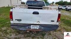 2000 FORD F250 XL SUPER DUTY PICK UP TRUCK - 202,414 MILES - 4 SPEED FLOOR SHIFT - 2 DOOR 0 V10,6.8L  -GASOLINE - INDSHIELD CRACKED - FRONT BUMPER DENTED AND SHOWS RUST - HOOD DENTED WITH RUST SPOT - DRIVERS SIDE DOOR FRONT FENDER AND DOOR BENT, TOP OF REAR REAR QUARTER PANEL DENTED TAILGATE DENTED, SCRATCHED, AND PUNCTURED - BUMPER SHOWS RUST AND DENTED- SIDE MOUNTED TOOL BOXES WITH RUST - PASSENGERS SIDE REAR QUARTER PANEL BENT IN SEVERAL PLACES WITH SCRATCHES, FRONT FENDER WHEEL DENTED - NUMEROUS SCRATCHES, WEAR, AND PECKS - SEATS SHOW WEAR AND HOLES  - VIN# 1FTNF20S0YEB61867