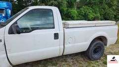 2000 FORD F250 XL SUPER DUTY PICK UP TRUCK - 202,414 MILES - 4 SPEED FLOOR SHIFT - 2 DOOR 0 V10,6.8L  -GASOLINE - INDSHIELD CRACKED - FRONT BUMPER DENTED AND SHOWS RUST - HOOD DENTED WITH RUST SPOT - DRIVERS SIDE DOOR FRONT FENDER AND DOOR BENT, TOP OF REAR REAR QUARTER PANEL DENTED TAILGATE DENTED, SCRATCHED, AND PUNCTURED - BUMPER SHOWS RUST AND DENTED- SIDE MOUNTED TOOL BOXES WITH RUST - PASSENGERS SIDE REAR QUARTER PANEL BENT IN SEVERAL PLACES WITH SCRATCHES, FRONT FENDER WHEEL DENTED - NUMEROUS SCRATCHES, WEAR, AND PECKS - SEATS SHOW WEAR AND HOLES  - VIN# 1FTNF20S0YEB61867