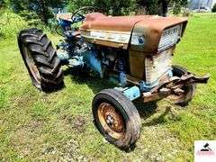 1968 FORD 4000 TRACTOR - 2 SPEED - HOURS UNKNOWN -  FIXER UPPER OR PARTS TRACTOR - BENT STEP - BUMPER BENT - METAL HOOD & PANELS RUSTY - SEAT CUSHIONS ARE GOINE - TRACTOR ROLLS - ONE REAR TIRE FLAT AND BUSTED - BEEN SITTING FOR SEVERAL YEARS -BOTH FRONT LIGHTS MISSING - REAR DRAW BAR - 3 POINT HITCH ARMS - HAS OIL - TRACTOR # C204765 - MODEL # 41024C - UNIT #  8E135 - ENGINE # 8C18A - TRANSMISSION # 8A05E - HYDRAULIC PUMP # 8018B - REAR AXLE # 8814B - HYDRAULIC UNIT #80151 - RURAL KING BATTERY SHIPPED IN MARCH 2014