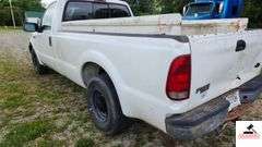 2000 FORD F250 XL SUPER DUTY PICK UP TRUCK - 202,414 MILES - 4 SPEED FLOOR SHIFT - 2 DOOR 0 V10,6.8L  -GASOLINE - INDSHIELD CRACKED - FRONT BUMPER DENTED AND SHOWS RUST - HOOD DENTED WITH RUST SPOT - DRIVERS SIDE DOOR FRONT FENDER AND DOOR BENT, TOP OF REAR REAR QUARTER PANEL DENTED TAILGATE DENTED, SCRATCHED, AND PUNCTURED - BUMPER SHOWS RUST AND DENTED- SIDE MOUNTED TOOL BOXES WITH RUST - PASSENGERS SIDE REAR QUARTER PANEL BENT IN SEVERAL PLACES WITH SCRATCHES, FRONT FENDER WHEEL DENTED - NUMEROUS SCRATCHES, WEAR, AND PECKS - SEATS SHOW WEAR AND HOLES  - VIN# 1FTNF20S0YEB61867