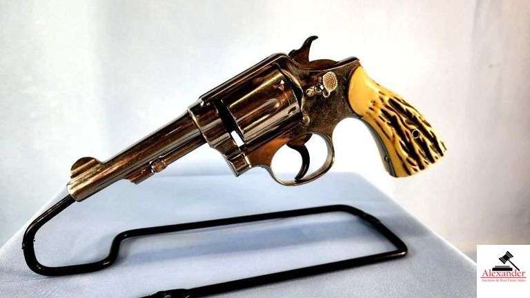 SMITH AND WESSON REVOLVER - 38 S&W SPECIAL (POSSIBLY FIRST MODEL) - 4“ BBL – NICKEL FINISH - STAG STYLE GRIPS – FRAME BARREL AND FLUTED CYLINDER SHOWS CARRY AND USE WEAR WITH MINOR RUBS – S/N 248180 image