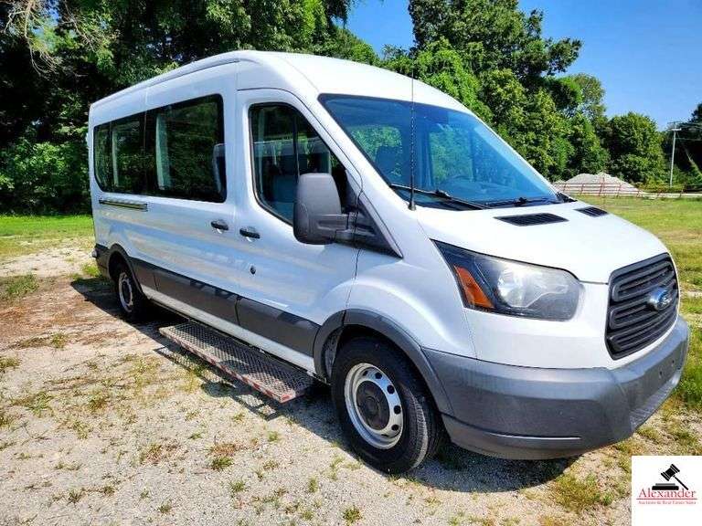 2017 FORD TRANSIT VAN V6, 3.5L TURBO ECO BOOST - 254,413 MILES - RUNNING BOARD STEPS ATTACHED - MINOR ROCK PECKS ON HOOD - MOLDING ABOVE STEP REMOVED / MISSING - DRIVERS SIDE CENTER PANEL SLIGHTLY BENT WITH TWO OR THREE RUBS VERY LIGHT DENT - LEFT SIDE REAR DOOR SMALL DENT  AND SCRATCH AT BOTTOM - RIGHT SIDE REAR DOOR SMALL SCRATCHES NEAR BOTTOM - SMALL PAINT PECK - HEAD LIGHT COVERS FADED - CLEAN INTERIOR - FOLDING SEATS 3 DOUBLES AND 2 SINGLES - BRAUNABILITY CENTURY SERIES  CHAIR LIFT - DOUBLE REAR DOORS - 10 CAPACITY (2 FRONT AND 8 REAR) - NO SPARE TIRE - V/N:  1FDZX2CG0HKB57661 image