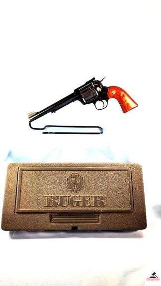 RUGER SUPER BLACKHAWK REVOLVER - .44 MAG - BLUE - BISLEY MODEL - CYLINDER ETCHED SILVER DESIGN - 7.5" BARREL - SINGLE ACTION - BRIGHT FINISHED GRIPS - DEEP BLUING - VERY LIGHT WEAR ON CYLINDER - ADJUSTABLE SIGHTS - LIGHT MUZZEL WEAR- ORIGINAL RUGER CASE & LOCK -  S/N 8779013G image