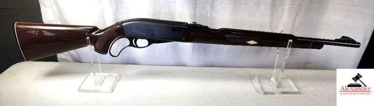 REMINGTON  22 LR LONG ONLY  NYLON 76   NONE VISIBLE REMINGTON NYLON 76 RIFLE - MOHAWK BROWN - LEVER ACTION - 22LR ONLY CAL. - STOCK & FOREARM SHOWS CARRYWEAR & SCRATCHES  - RECEIVER BLUING IS GOOD WITH LIGHT PITTING & SMAOOTH - ADJ. REAR SITE -  S/N NONE VISIBLE image