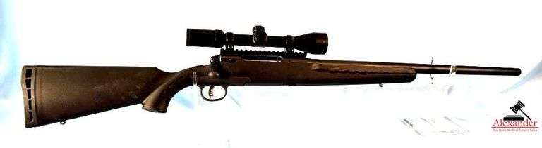 SAVAGE ARMS AXIS RIFLE - CALIBER 223 REM - WEAVER SCOPE 3-9X40 - BLACK SYNTHIC STOCK & FOREARM - TOP RAIL - BOLT ACTION - MINT CONDITION - 22" BLACK TARGET BARREL - S/N K266145 image