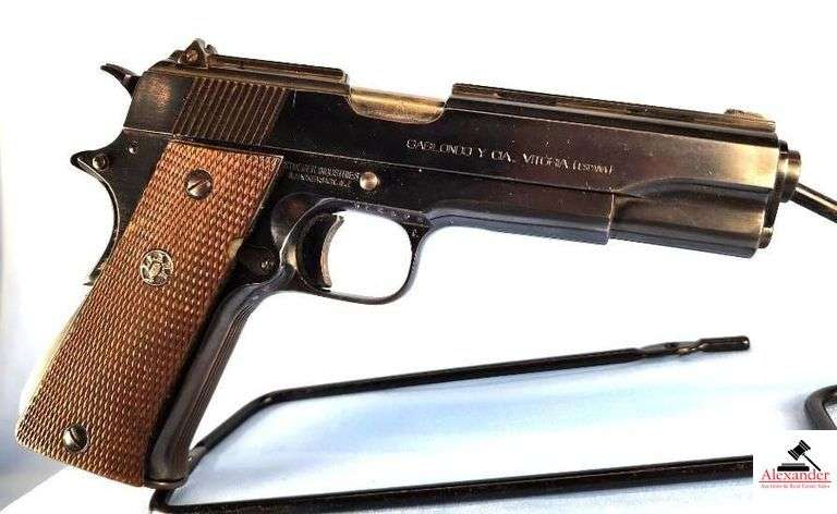 LLAMA 1911 PISTOL – 45 CAL. – SEMI-AUTO – CHECKERED WOOD GRIPS – GOOD CONDITION – DARK BLUING – BLUING GOOD – EXCELLENT CONDITION – S/N 715974 image