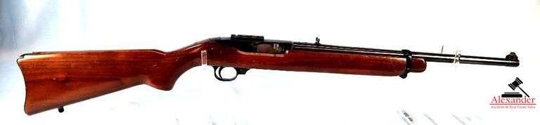 RUGER CARBINE RIFLE - .44MAG CAL - STOCK WITH METAL BUTT PLATE & FOREARM SHOWS CARRY WEAR - FINISH IS GOOD COLOR BUT SHOWS CARRY WEAR - FEW FINISH RUBS - RECEIVER SHOWS SOME CARRY & USE WEAR - BLUING WORN ON TOP OF RECEIVER - PECK ON TOP OF PISTOL GRIP BEHIND RECEIVER - S/N 102-02831 image