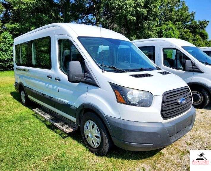 2017 FORD TRANSIT VAN - V6, 3.5L TURBO ECO BOOST - 222,102 MILES -RUNNING BOARD STEPS ATTACHED - FEW ROCK PECKS ON HOOD - FRONT PLASTIC HAS CHIP MISSING - DRIVERS SIDE DOOR FEW ROCK PECKS - PLASTIC COVER ON REAR DOOR GUARD HAS SMALL CRACK - FEW LIGHT SCRATCHES ON BACK DOOR - PASSENGER REAR DOOR VERY SMALL SCRATCH - CLEAN INTERIOR - FOLDING SEATS 3 DOUBLES AND 2 SINGLES - BRAUNABILITY CENTURY SERIES CHAIR LIFT - DOUBLE REAR DOORS - 10 CAPACITY (2 FRONT AND 8 REAR)   HAS NOISY REAR AXLE (NEEDS REPAIR) - NO SPARE TIRE- V/N:  1FDZX2CG2HKB57662 image