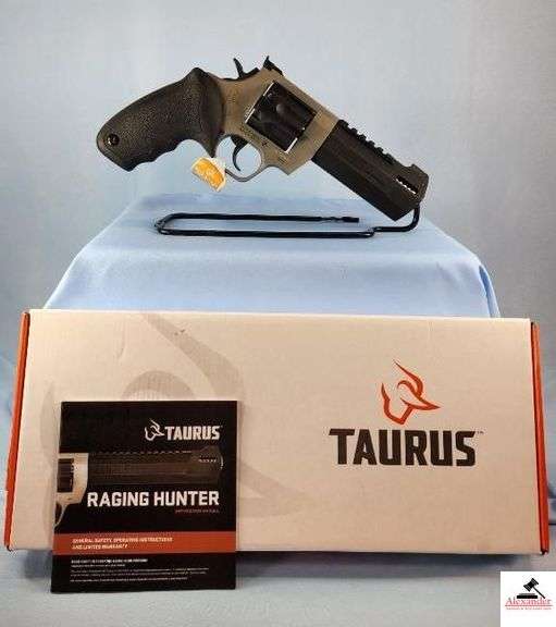 TAURUS RAGING HUNTER DOUBLE ACTION REVOLVER - .357 MAG - 5.12" BARREL - PICATINNY RAIL - RUBBER GRIP -  ADJUSTABLE REAR SIGHT - PORTED BARREL - IN BOX WITH LOCK AND BOOKS - S/N AED311621 image