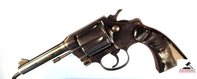 COLT POLICE POSITIVE SPECIAL REVOLVER – 38 S&W - BLUE BARREL – CUSTOM BLACK & WHITE SHINY PISTOL GRIPS – GRIP FRAME ENSCRIBED RHKP 8670 – BLUING GOOD FOR AGE – BLUING EVENLY WORN – SLIGHT MUZZLE AND SIGHT WEAR POSSIBLY FROM HOLSTER – GUN IS TIGHT – S/N 773994 image