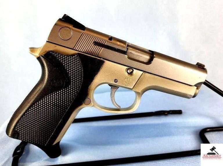 SMITH AND WESSON MD. 6926 PISTOL – 9MM - SEMI-AUTO – STANLESS – BLACK CHECKERED GRIPS – GUN ALMOST MINT – LIGHT HOLSTER RUB ON BBL – S/N THF9153 image