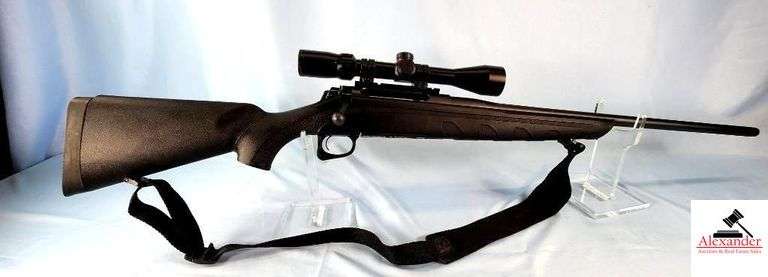 REMINGTON MODEL 770 BOLT RIFLE - 270 WIN CAL - SIMMONS 3-9X40 SCOPE -  BOLT ACTION - BLACK SYNTHETIC STOCK & BARREL - MINT CONDITION - SMALL RING AT MUZZLE - NYLON SLING - YOUTH MODEL - S/N M72100427 image