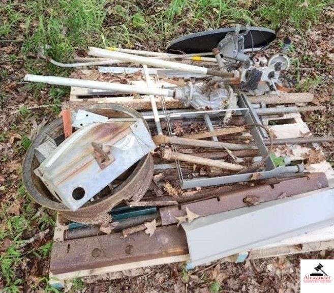 (2) PALLETS - MISC. - SALVAGE STEEL PCS.- ELECTRIC BOX - TIRE RIM - STEEL CHANNEL & PLATE  2 GAS PUMPS - SATELLITE DISH - WIRE - ETC  (WEST OF TOOL SHED) image