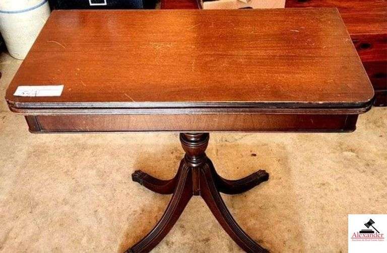 MAHOGANY GAME TABLE - ROTATING TOP - ONE PANEL HAS SCRATCHES & 2 WATER MARKS - (GARAGE) image