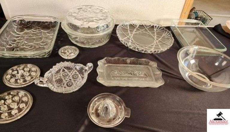 LORD'S SUPPER DISH WITH GRAPE BORDER - FRUIT & VEGTABLE CASSEROLE DISH - PRESSED OBLONG FRUIT & VEGTABLE BOWL - ROUND SERVING TRAY - ROUND PYREX - RECTANGLE PYREX - JUICER - TWO LARGE CLEAR FLOWER FROGS - ONE SMALL CHIPPED FLOWER FROG - (GARAGE) image