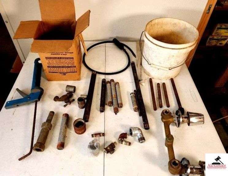 USED GALVANIZED PIPE REPAIR CAULKING GUN - BUCKET OF SMALL PIPE - (3) 5 GALLON BUCKETS OF USED PARTS - PVC ELBOWS - SUPPLY LINES (SHOP) image